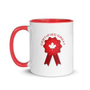 White ceramic coffee mug with a red handle and rim featuring a red award ribbon emblem with a white maple leaf in the center and 'CERTIFIED GREAT' arched over top in red text.