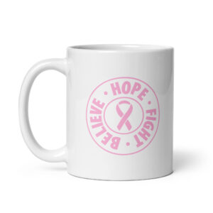 Believe Hope Fight Cancer White glossy ceramic coffee mug featuring a pink dandelion whose seeds drift into tiny pink ribbons above the cursive text Breast Cancer Awareness.