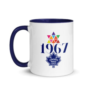 White ceramic coffee mug with a blue contrasting handle and interior, featuring a distressed hockey graphic and text reading "JUST ONCE BEFORE I DIE".