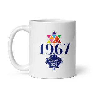 White ceramic coffee mug with a blue distressed graphic featuring hockey players, a maple leaf, and text reading "JUST ONCE BEFORE I DIE".