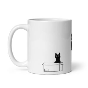 White ceramic coffee mug with a black cat illustration in a box.