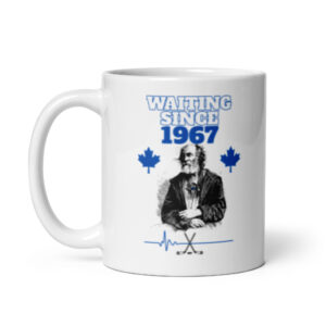 White ceramic coffee mug with 'Waiting Since 1967' text and Canadian maple leaves.