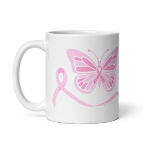 White ceramic coffee mug with pink butterfly and breast cancer awareness ribbon design.