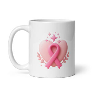Pink ribbon and heart on white ceramic coffee mug for breast cancer awareness.